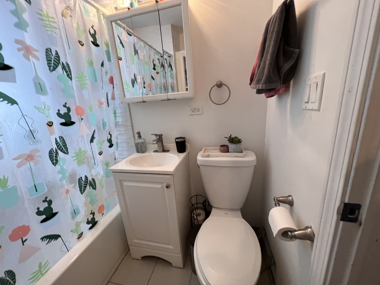 Undisclosed Address Chicago, IL 60618 - Photo 11 of 13 a bathroom with a toilet and a sink