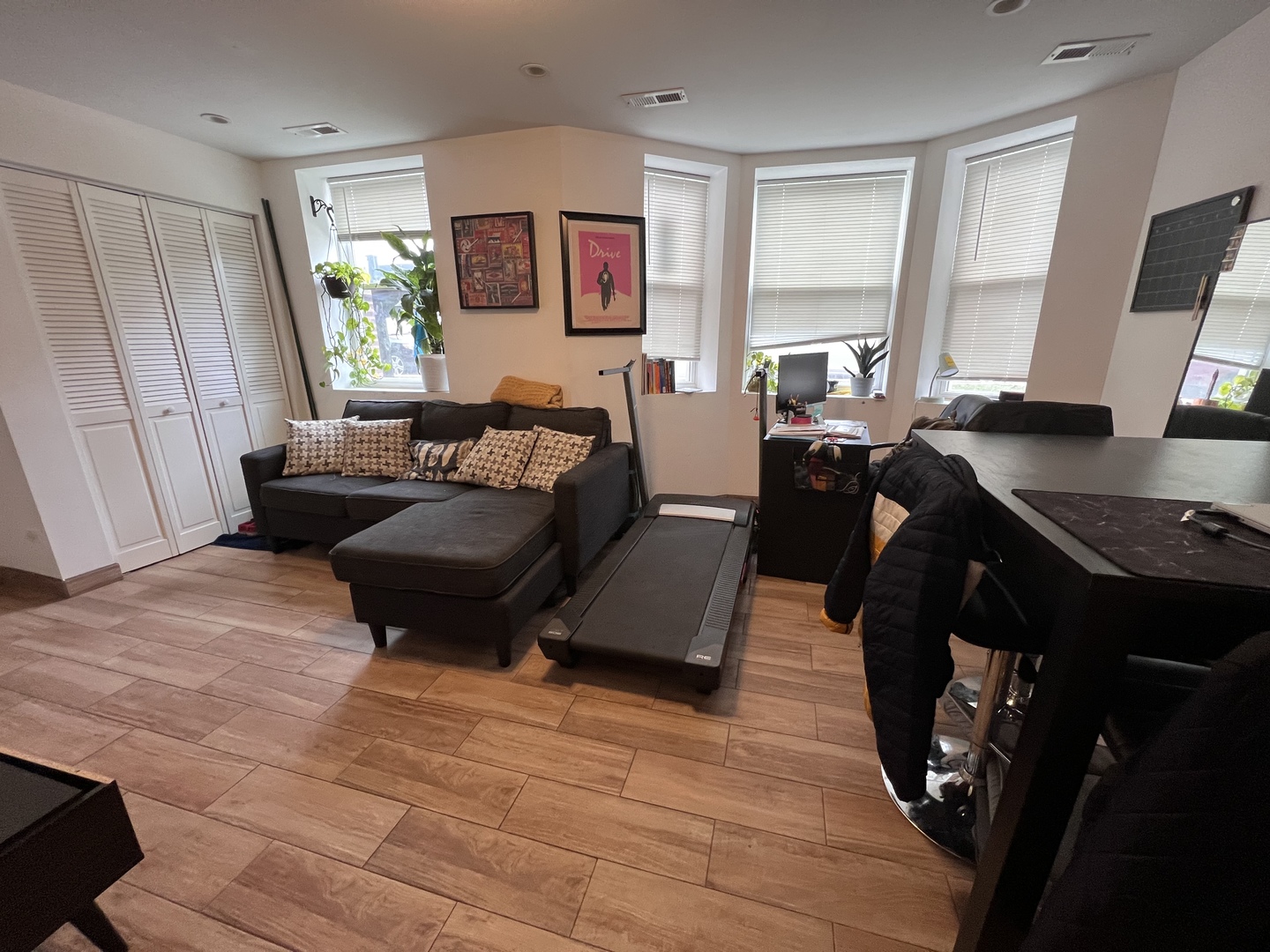 Undisclosed Address Chicago, IL 60618 - Photo 3 of 13 a living room with furniture and a window
