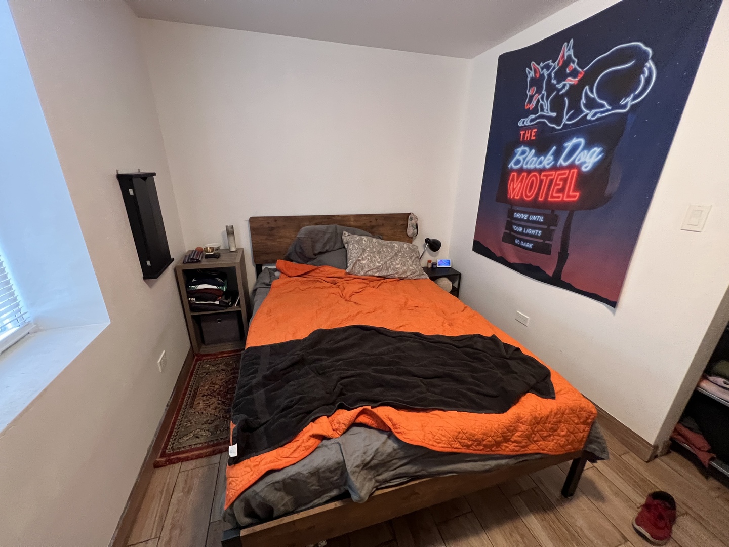 Undisclosed Address Chicago, IL 60618 - Photo 6 of 13 a bed sitting in a bedroom next to a window