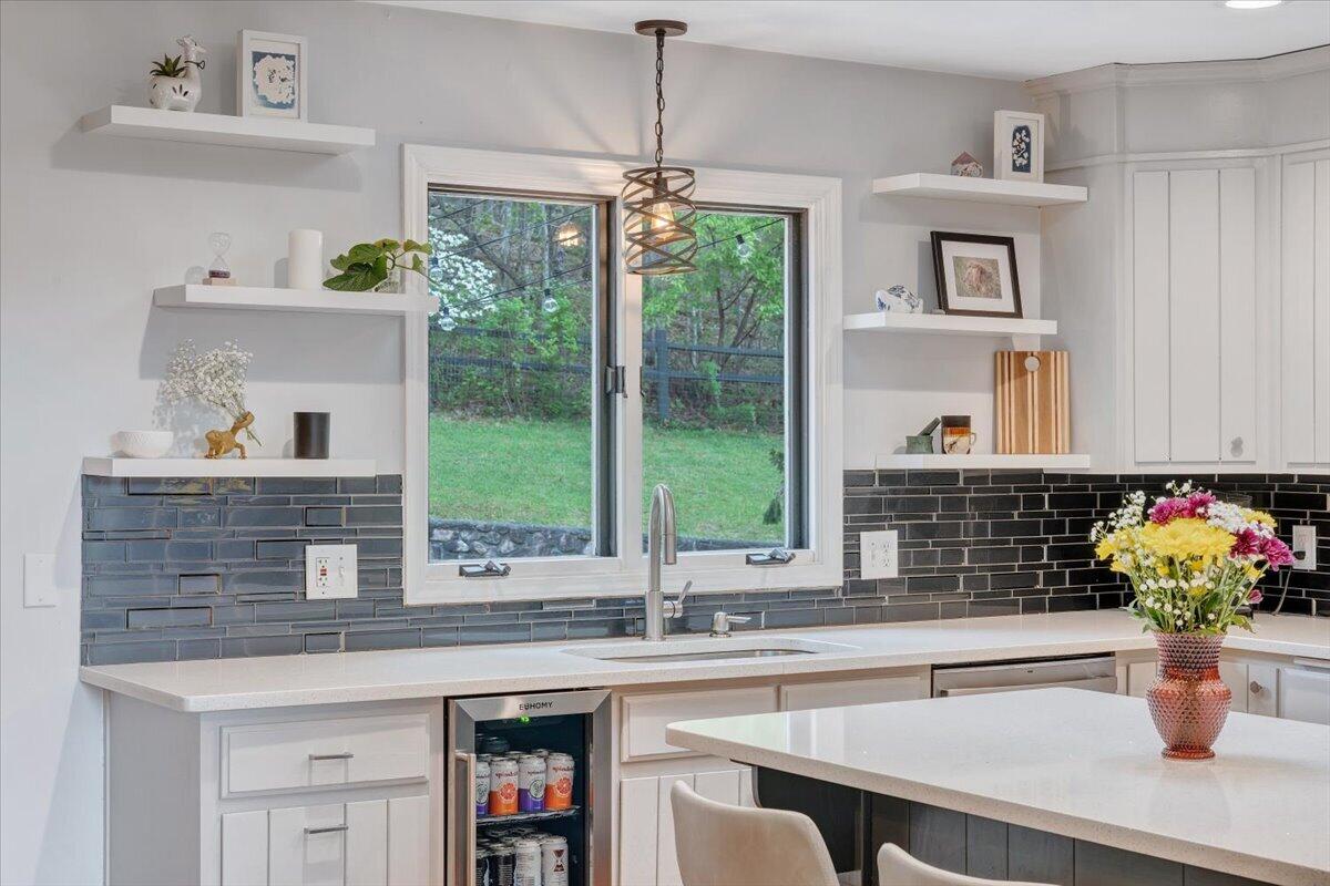 6925 Shaver Road Roanoke, VA 24018 - Photo 28 of 94 a kitchen with a sink and large window