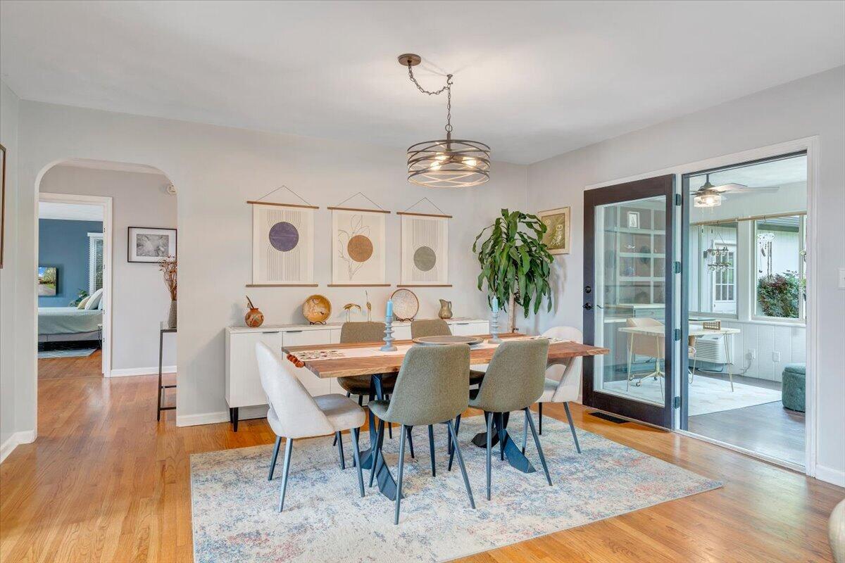 6925 Shaver Road Roanoke, VA 24018 - Photo 33 of 94 a view of a dining room with furniture wooden floor and chandelier
