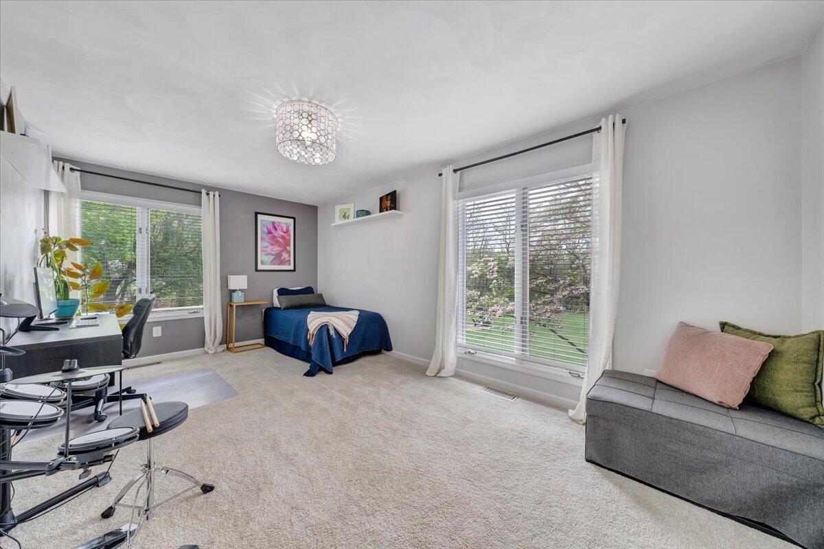 6925 Shaver Road Roanoke, VA 24018 - Photo 57 of 94 a bedroom with furniture and a large window