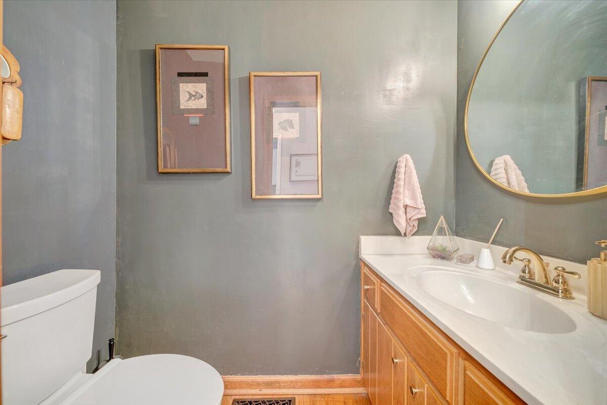 6925 Shaver Road Roanoke, VA 24018 - Photo 59 of 94 a bathroom with a sink vanity mirror and toilet
