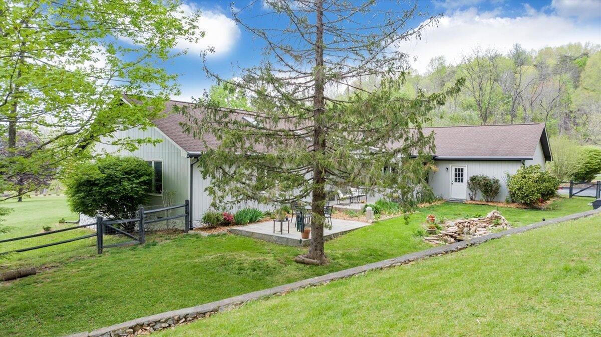 6925 Shaver Road Roanoke, VA 24018 - Photo 91 of 94 a view of a house with a backyard