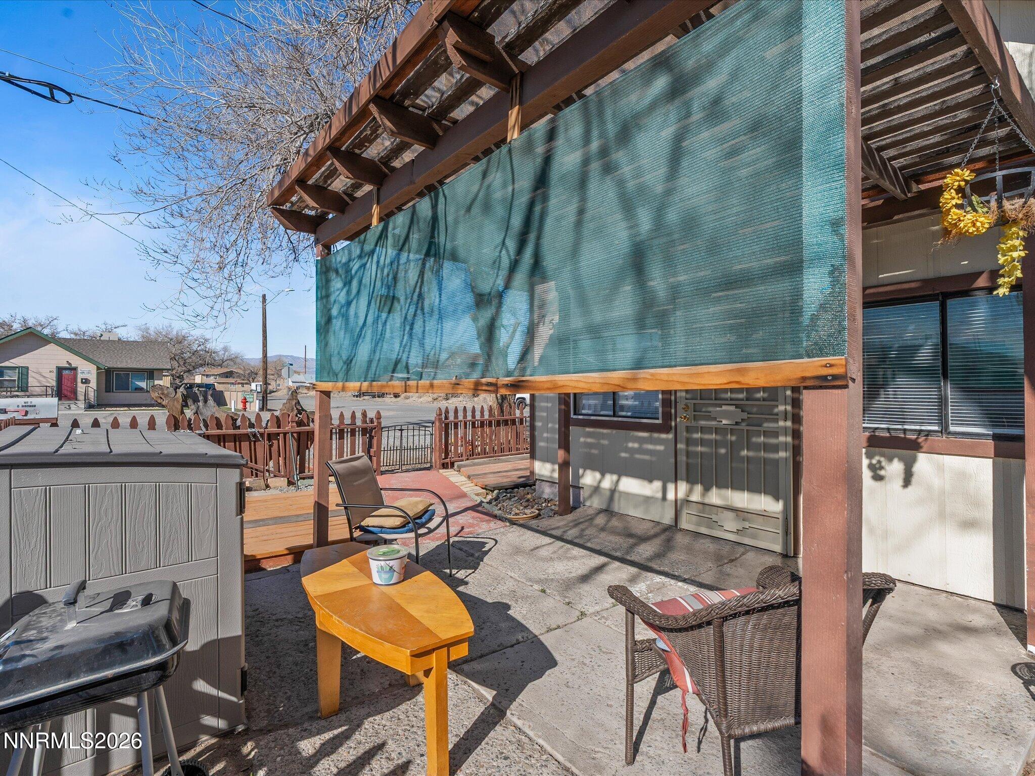 75 South Center Street, Unit A B Fernley, NV 89408 - Photo 12 of 41 a view of a chairs and table in the patio