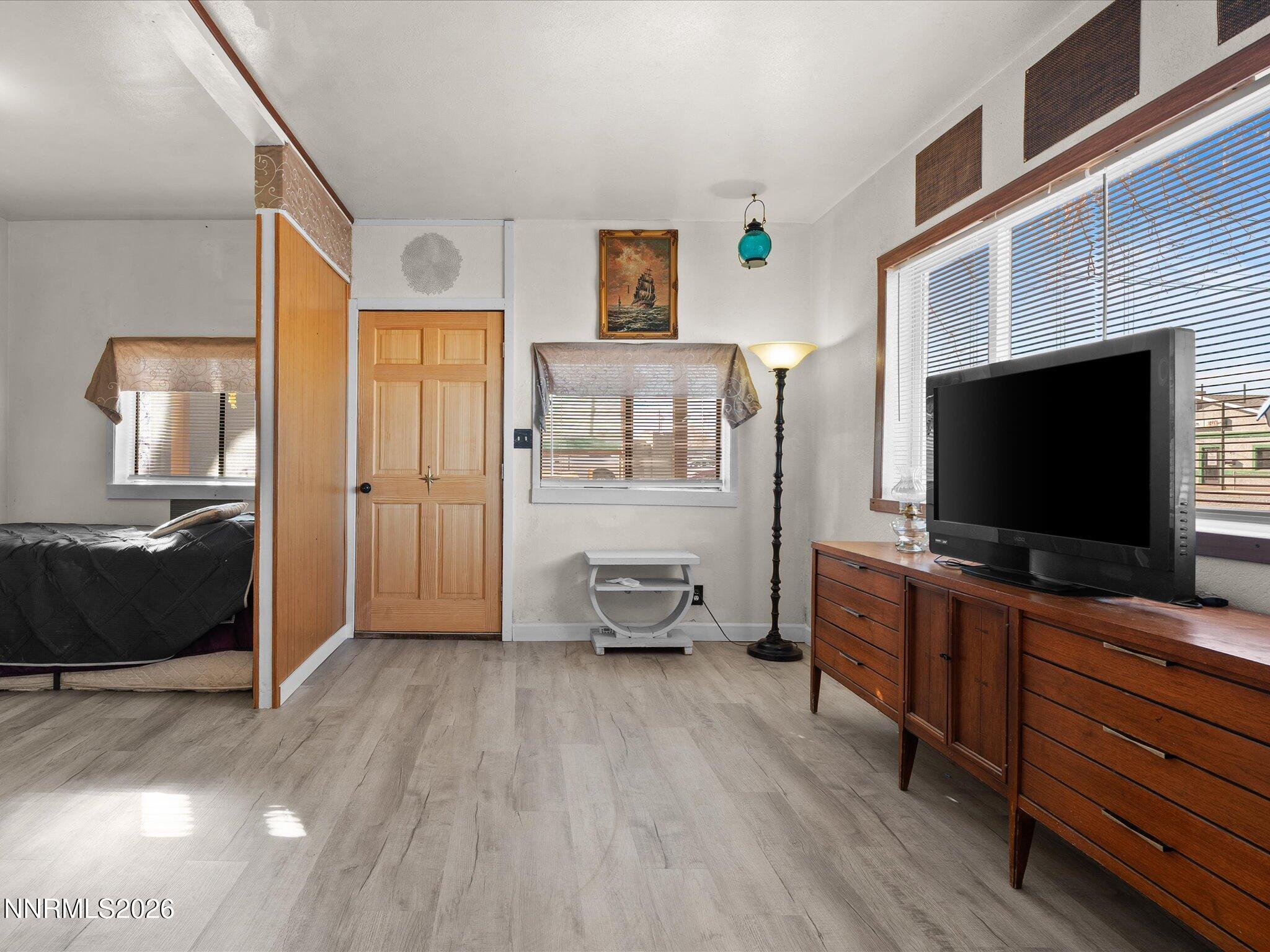 75 South Center Street, Unit A B Fernley, NV 89408 - Photo 15 of 41 a living room with furniture and a flat screen tv