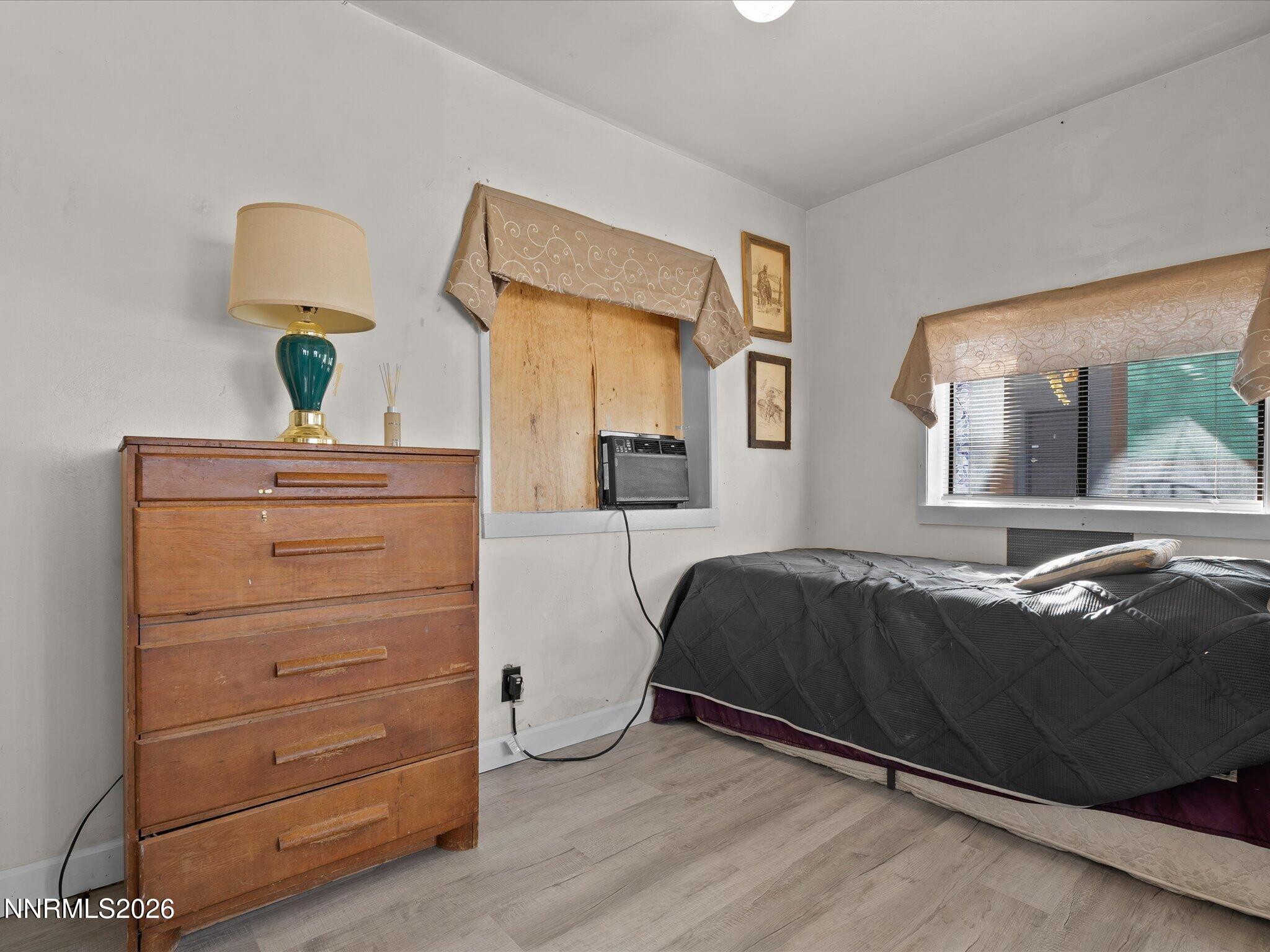 75 South Center Street, Unit A B Fernley, NV 89408 - Photo 23 of 41 a bedroom with a bed and a window
