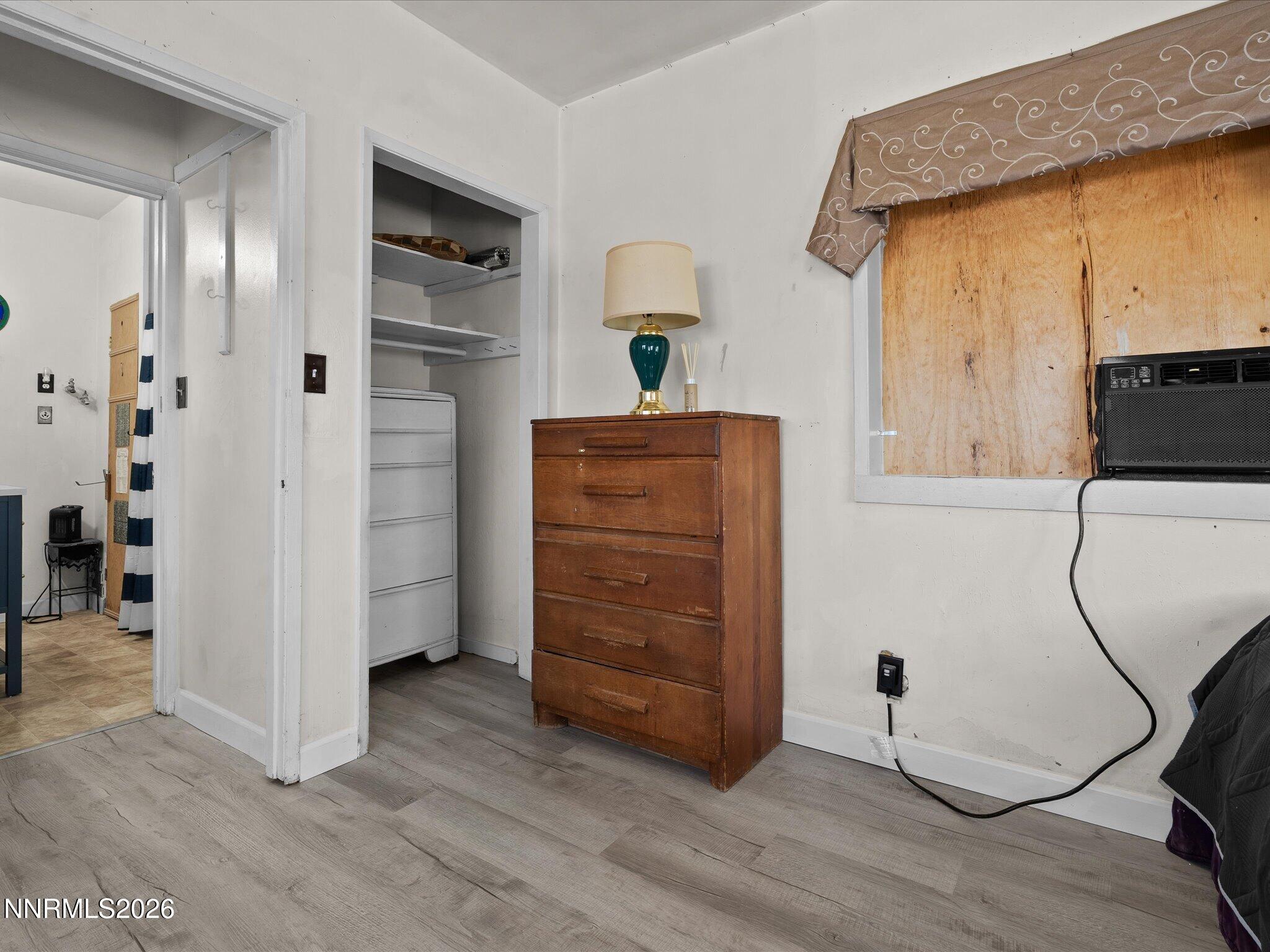 75 South Center Street, Unit A B Fernley, NV 89408 - Photo 26 of 41 a view of walk in closet with clothes and shoes