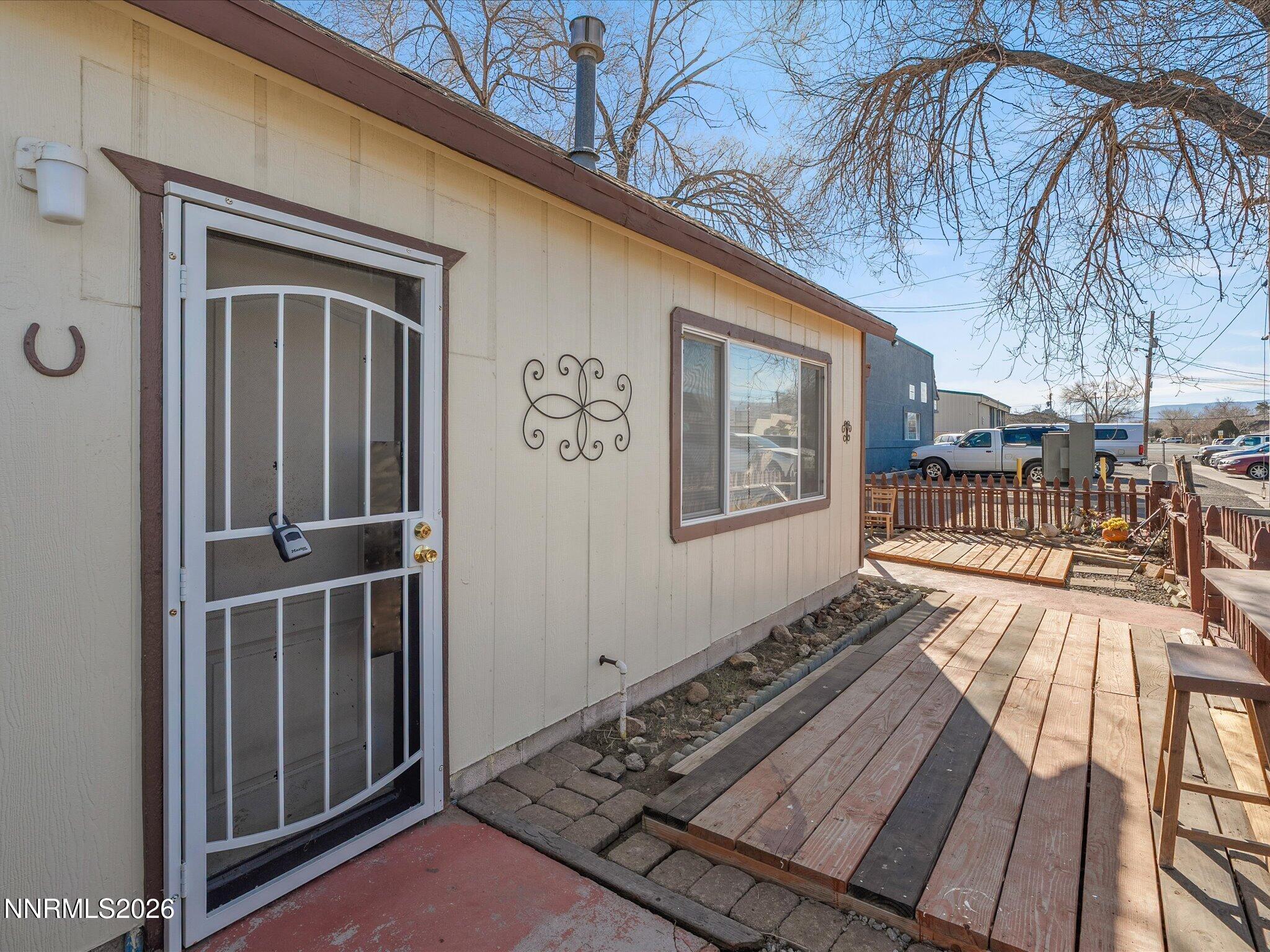 75 South Center Street, Unit A B Fernley, NV 89408 - Photo 5 of 41 a view of a house with backyard and deck