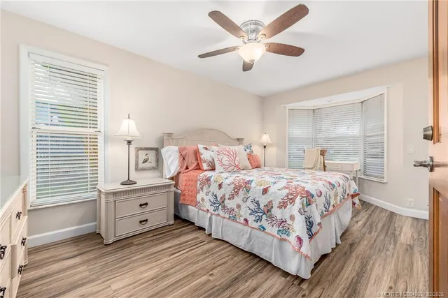 a bedroom with bed and window