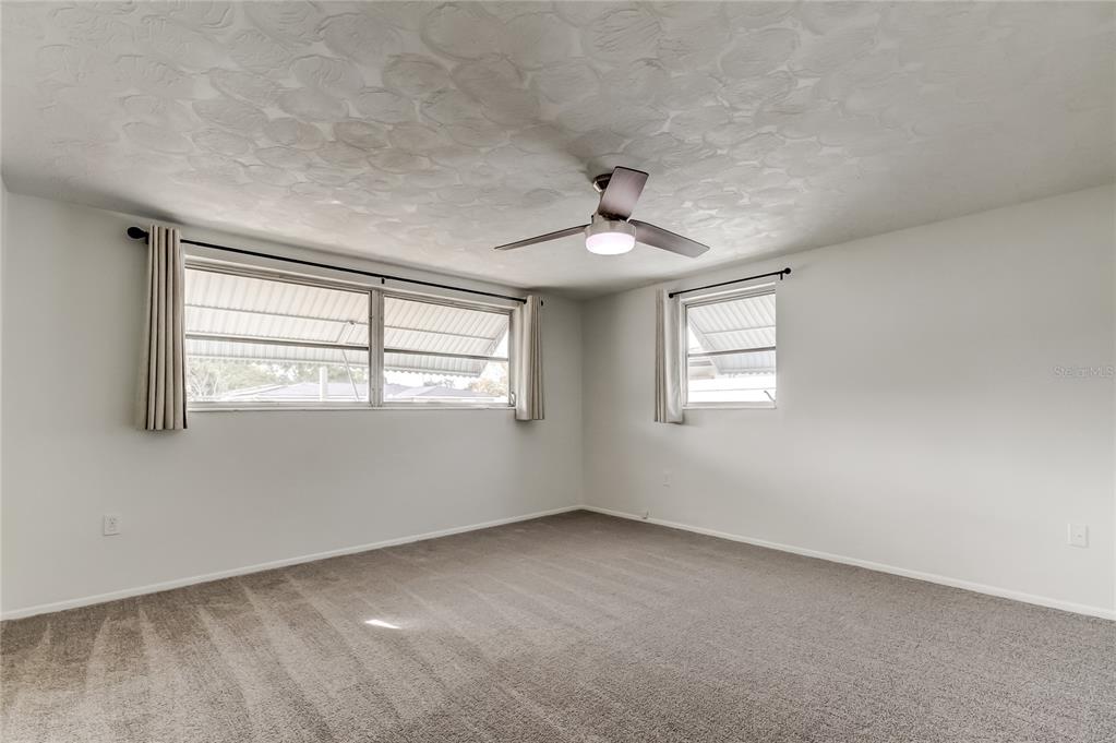 5753 Bantam Avenue New Port Richey, FL 34652 - Photo 28 of 47 a view of an empty room with a window