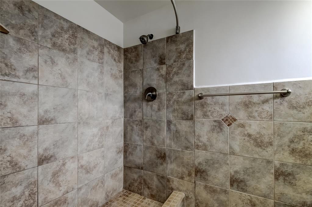 5753 Bantam Avenue New Port Richey, FL 34652 - Photo 32 of 47 a bathroom with a shower