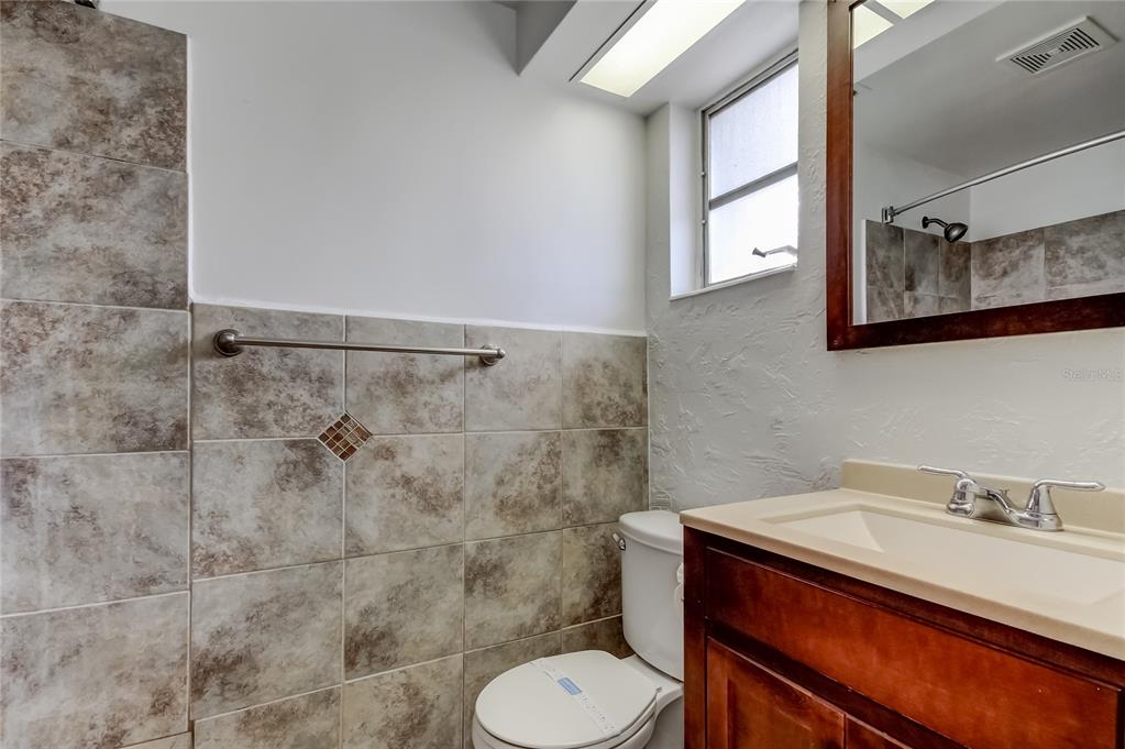 5753 Bantam Avenue New Port Richey, FL 34652 - Photo 33 of 47 a bathroom with a sink and a toilet