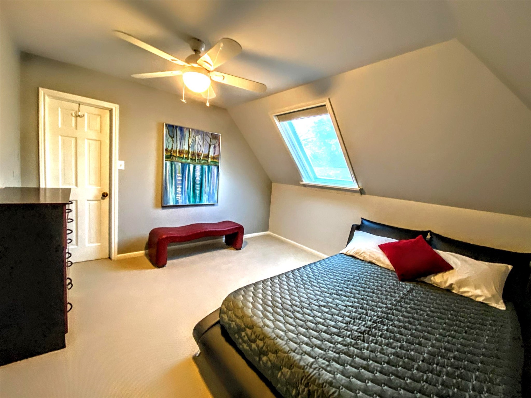 4401 Roseland Street Houston, TX 77006 - Photo 36 of 46 a bedroom with a bed and window