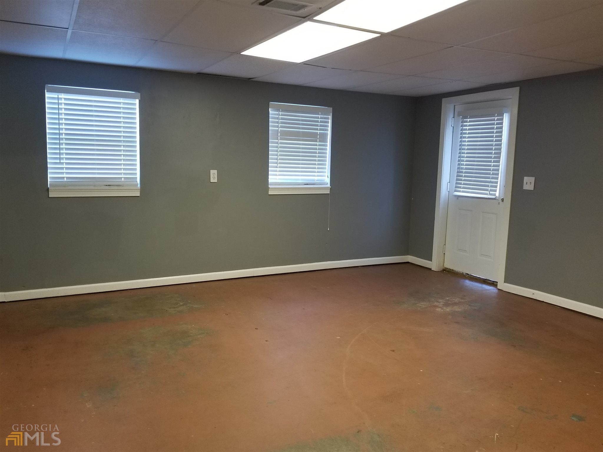 163 Tommy Barnett Road Nicholson, GA 30565 - Photo 11 of 14 an empty room with a window