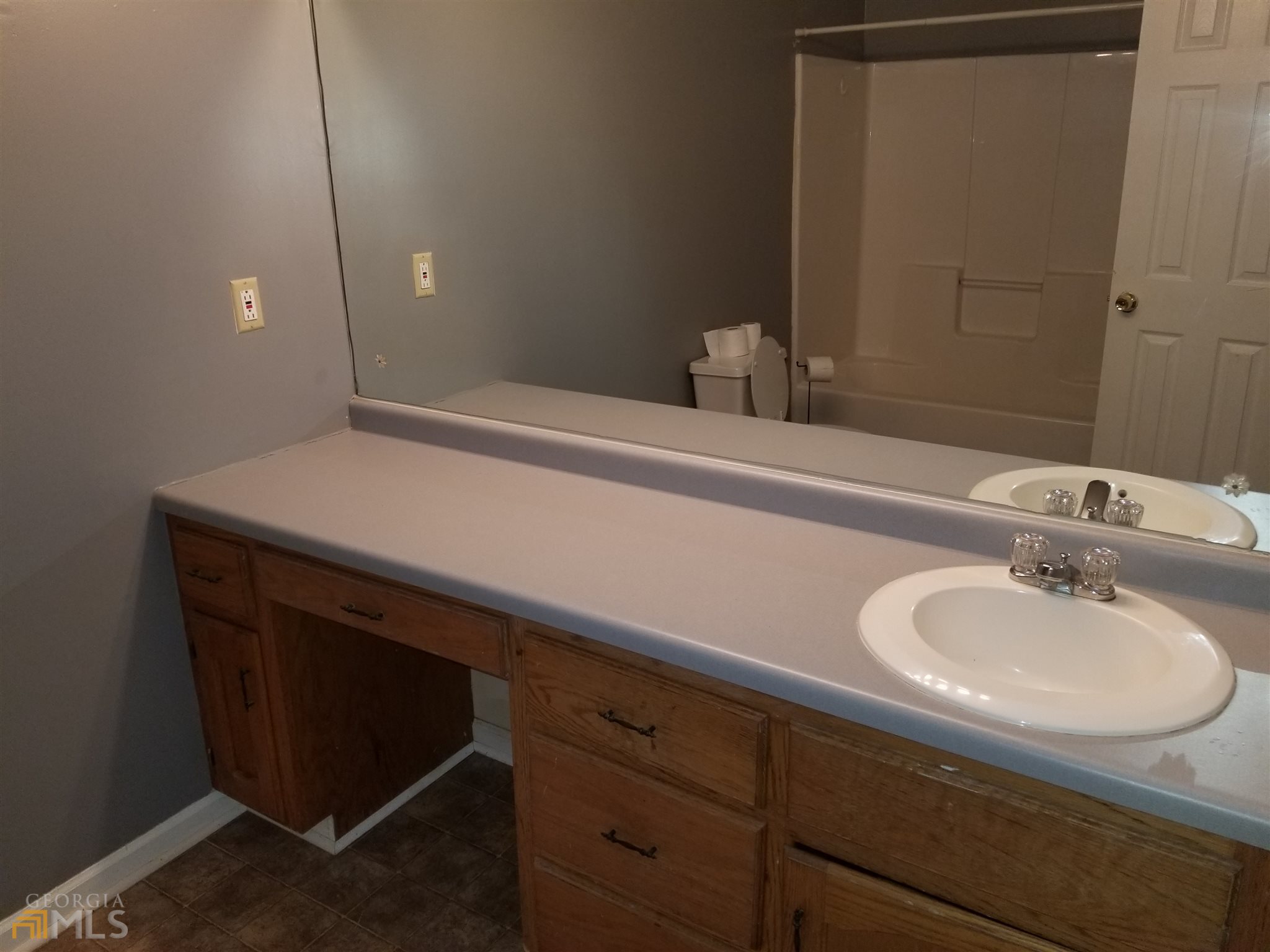 163 Tommy Barnett Road Nicholson, GA 30565 - Photo 7 of 14 a bathroom with a sink and a mirror