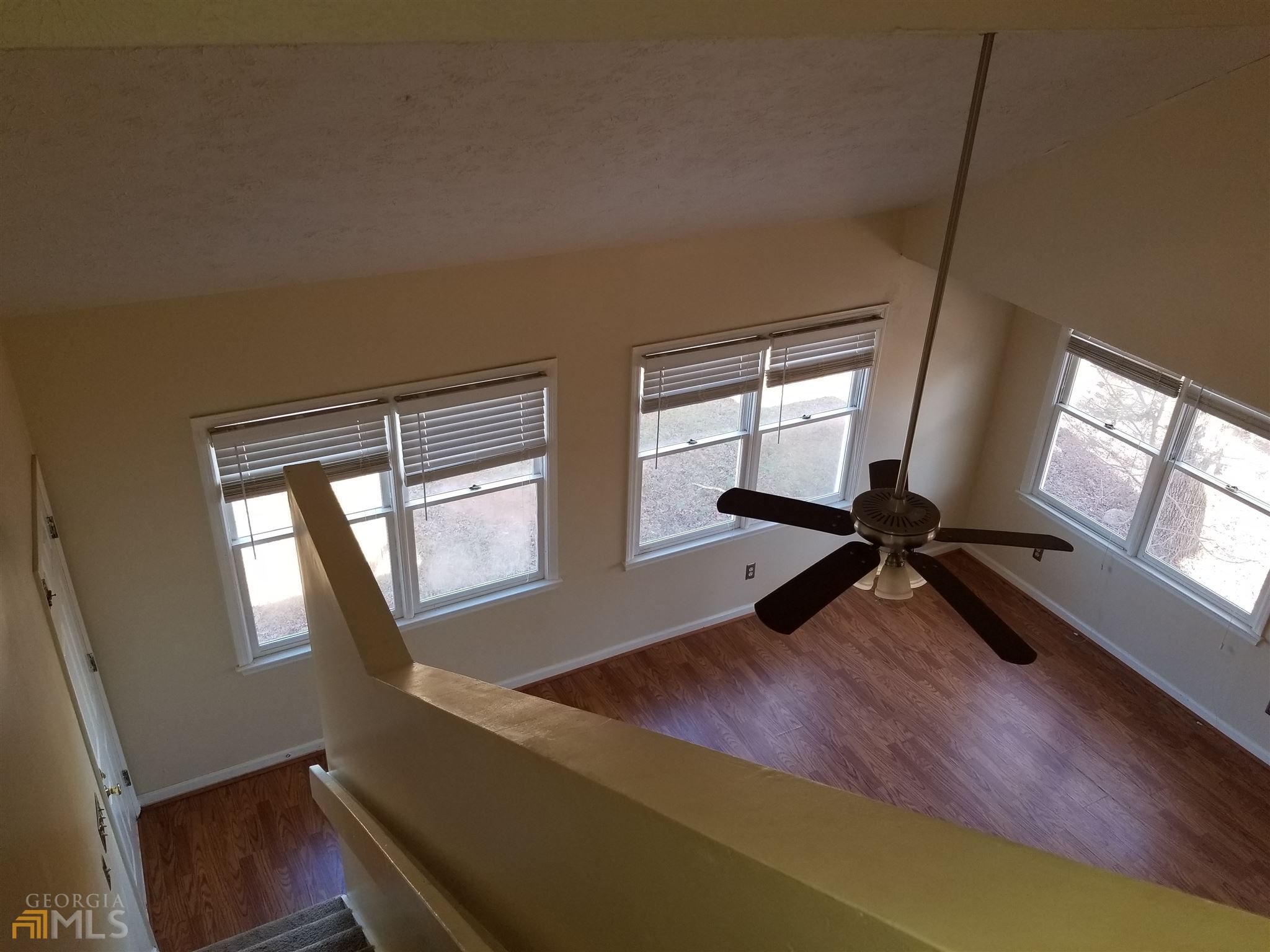 163 Tommy Barnett Road Nicholson, GA 30565 - Photo 8 of 14 a room with furniture and a window