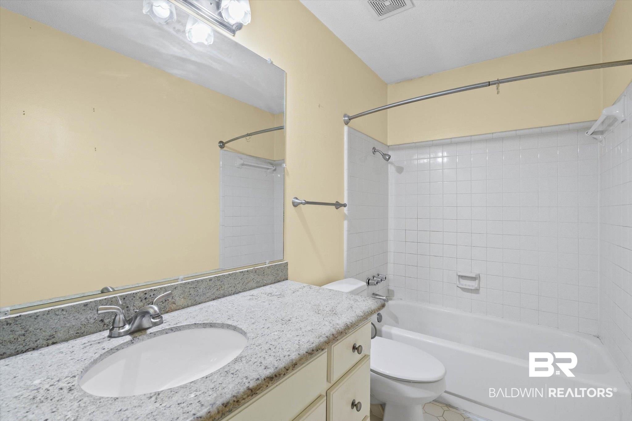 6300 Christopher Drive North Mobile, AL 36609 - Photo 14 of 22 Full bath featuring shower / bath combination and vanity