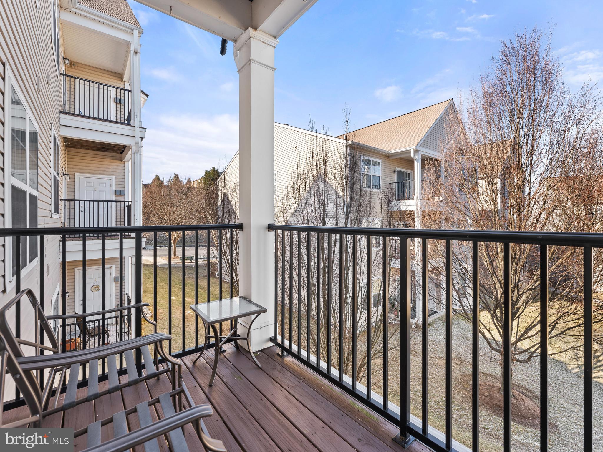 522 Creekside Drive Brookhaven, PA 19015 - Photo 18 of 28 a balcony with wooden floor and fence