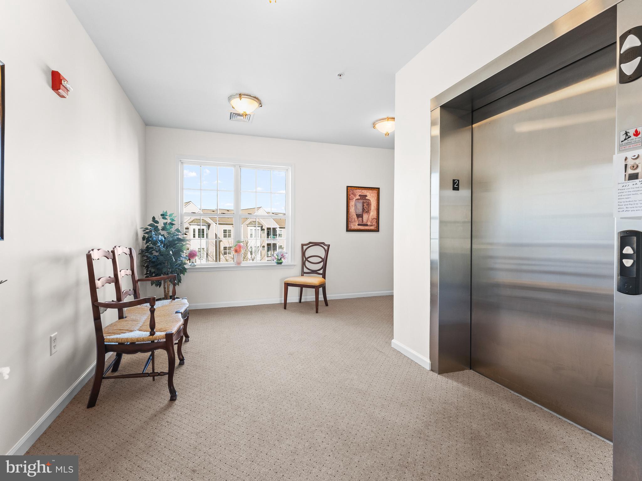 522 Creekside Drive Brookhaven, PA 19015 - Photo 22 of 28 a living room with furniture and a window