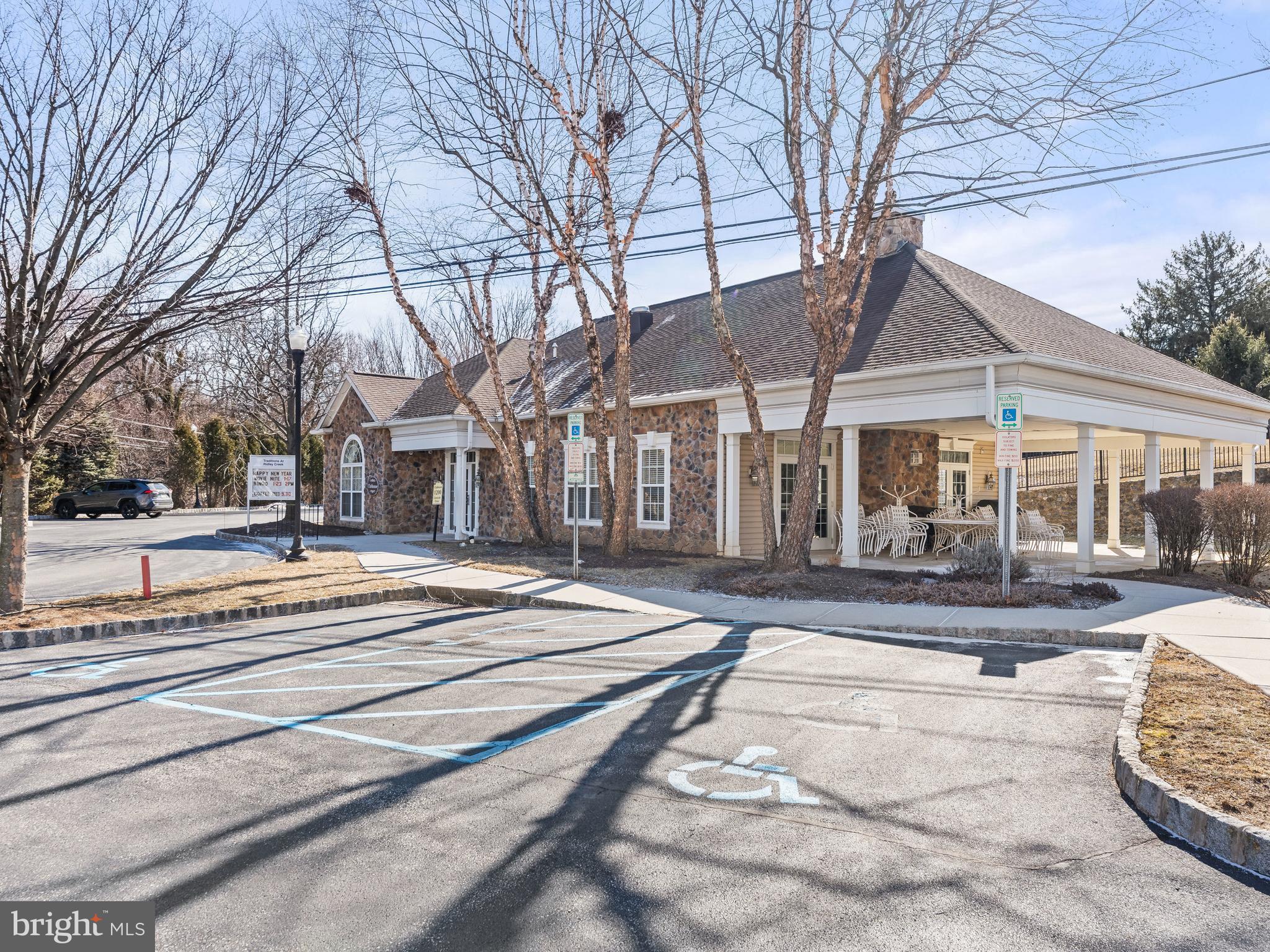 522 Creekside Drive Brookhaven, PA 19015 - Photo 25 of 28 a view of a white house with a large tree