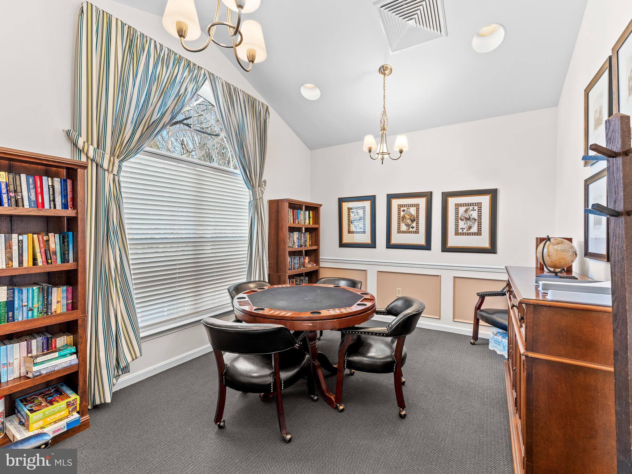 522 Creekside Drive Brookhaven, PA 19015 - Photo 28 of 28 a dining room with furniture and a book shelf