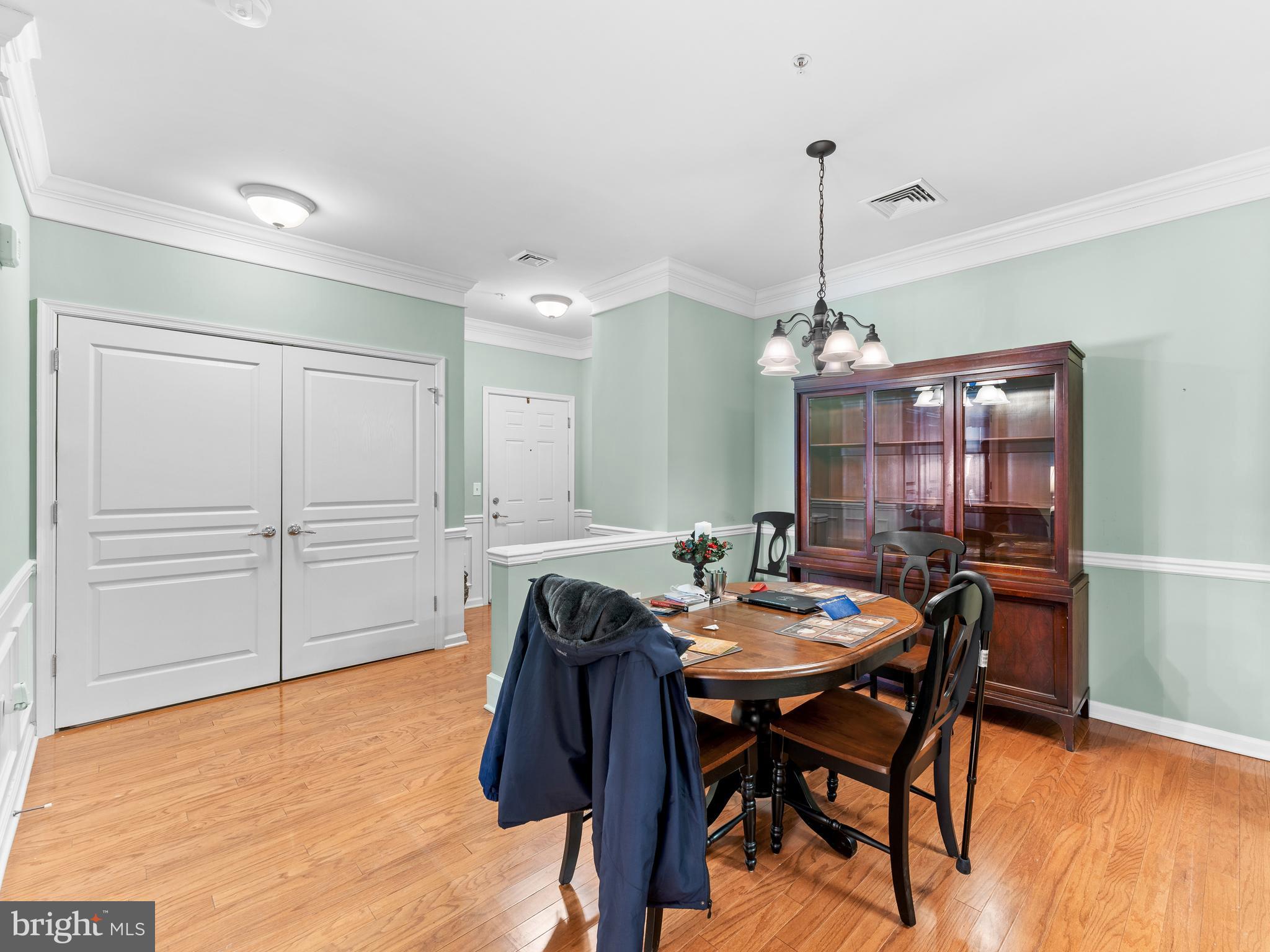 522 Creekside Drive Brookhaven, PA 19015 - Photo 4 of 28 a view of a dining room with furniture and wooden floor