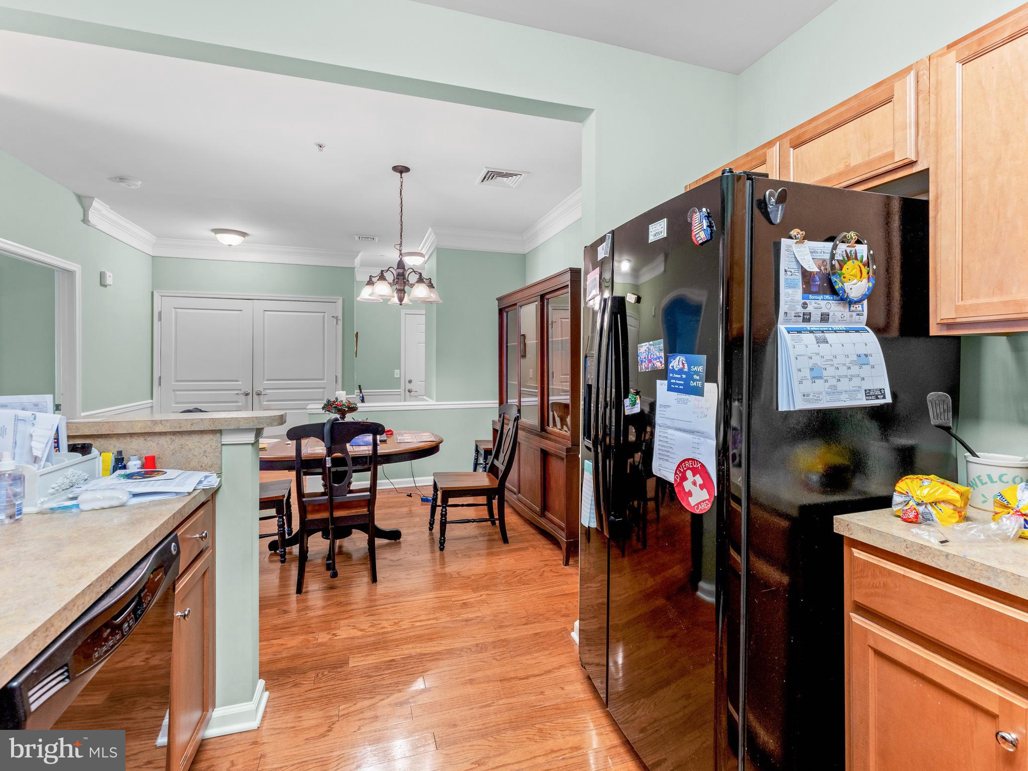 522 Creekside Drive Brookhaven, PA 19015 - Photo 6 of 28 a kitchen view of a dining table chairs and entryway