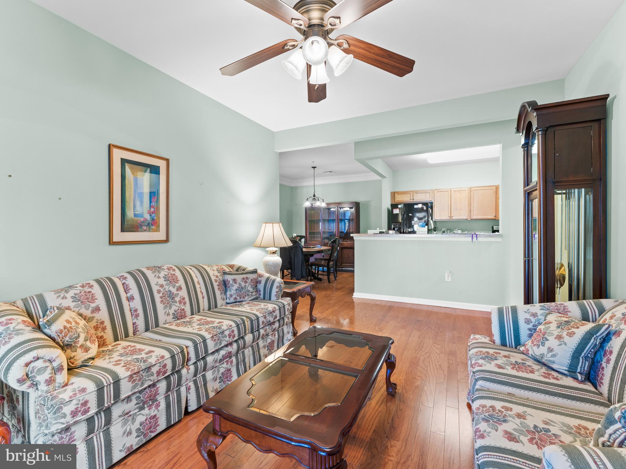 522 Creekside Drive Brookhaven, PA 19015 - Photo 8 of 28 a living room with furniture and wooden floor