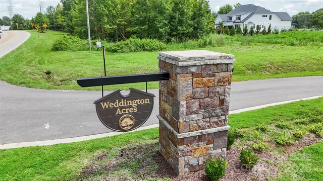 a view of a table and chairs in the garden