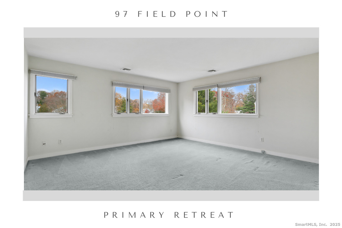 97 Field Point Drive, Unit 97 Fairfield, CT 06824 - Photo 21 of 40 a living room with a window