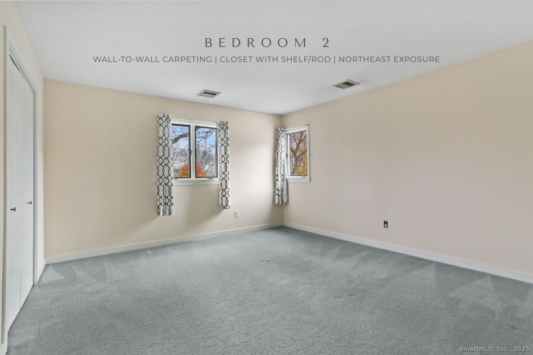 97 Field Point Drive, Unit 97 Fairfield, CT 06824 - Photo 25 of 40 a view of empty room with window