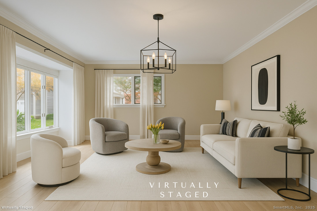 97 Field Point Drive, Unit 97 Fairfield, CT 06824 - Photo 7 of 40 a living room with furniture or couch and a window