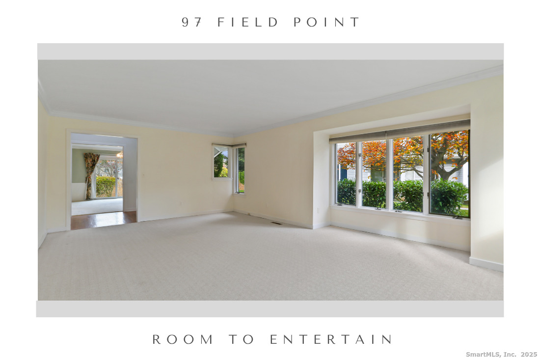 97 Field Point Drive, Unit 97 Fairfield, CT 06824 - Photo 8 of 40 a view of an empty room with a window