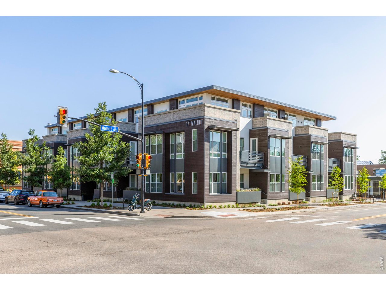 1707 Walnut Street, Unit 209 Boulder, CO 80302 - Photo 13 of 16 a front view of a building with street