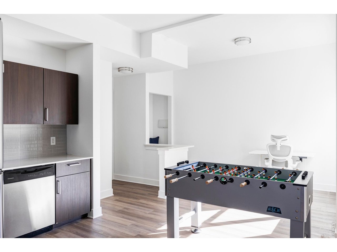 1707 Walnut Street, Unit 209 Boulder, CO 80302 - Photo 5 of 16 a kitchen with a refrigerator and a stove