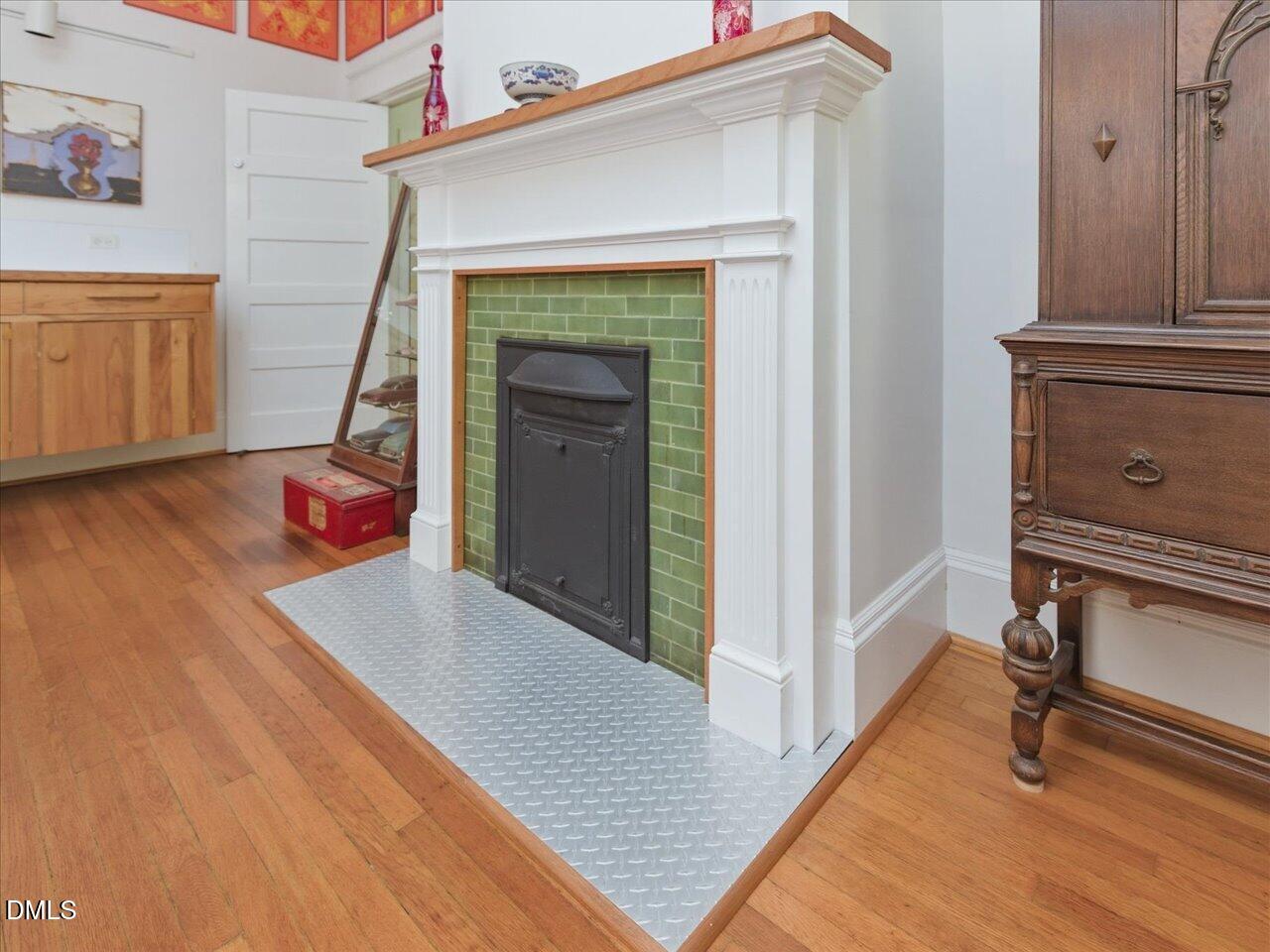 215 Hillcrest Road Raleigh, NC 27605 - Photo 33 of 97 a view of a hallway with wooden floor and staircase