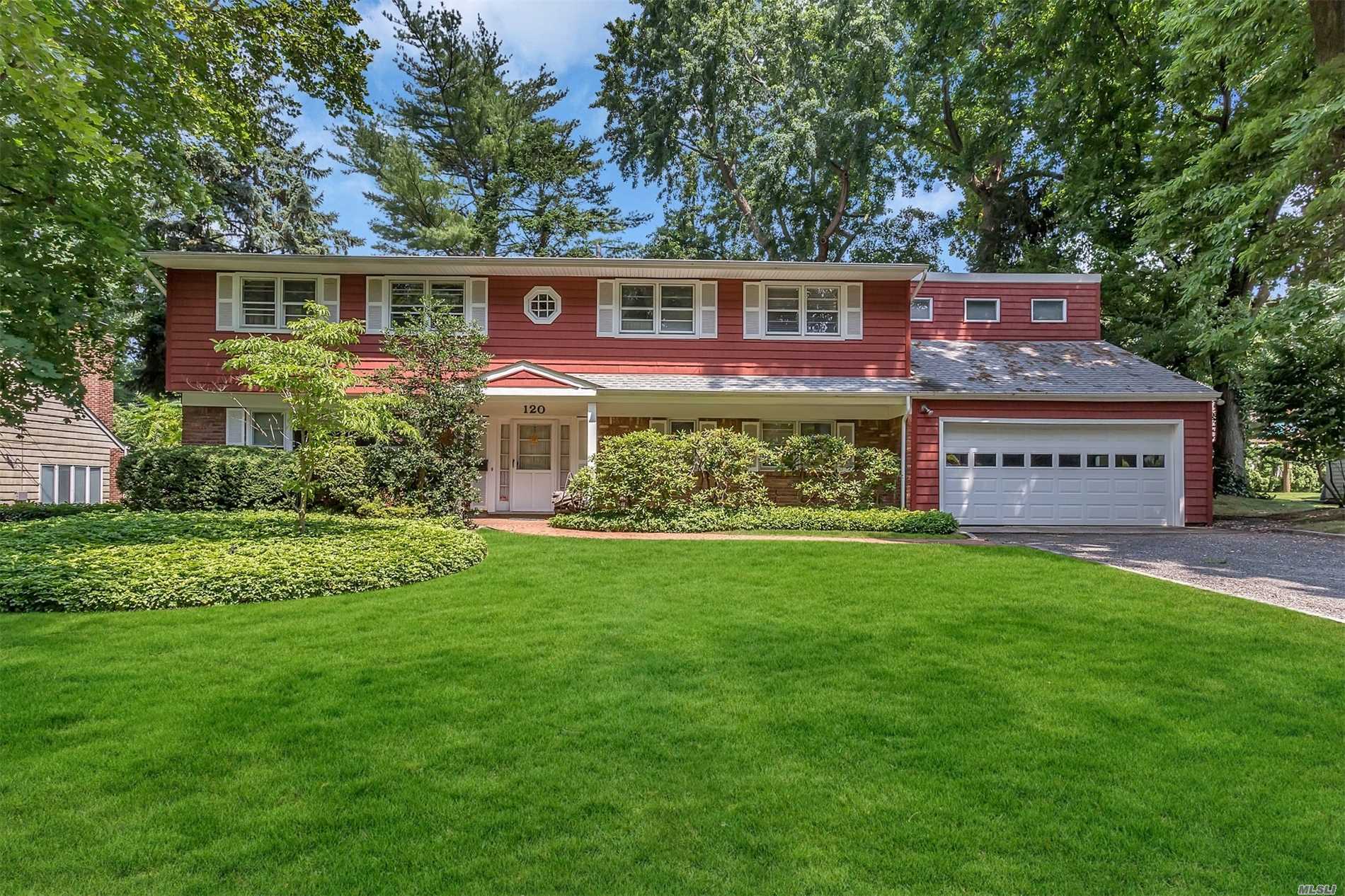 120 Chestnut Road Manhasset, NY 11030 - Photo 1 of 1 a view of a house with a yard