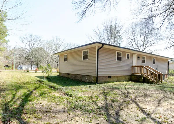 a view of backyard of house