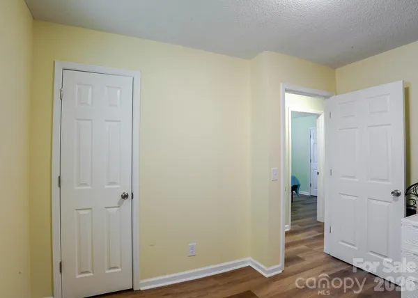 a view of a bathroom with closet area