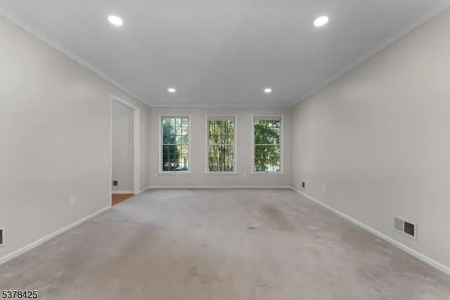 an empty room with windows