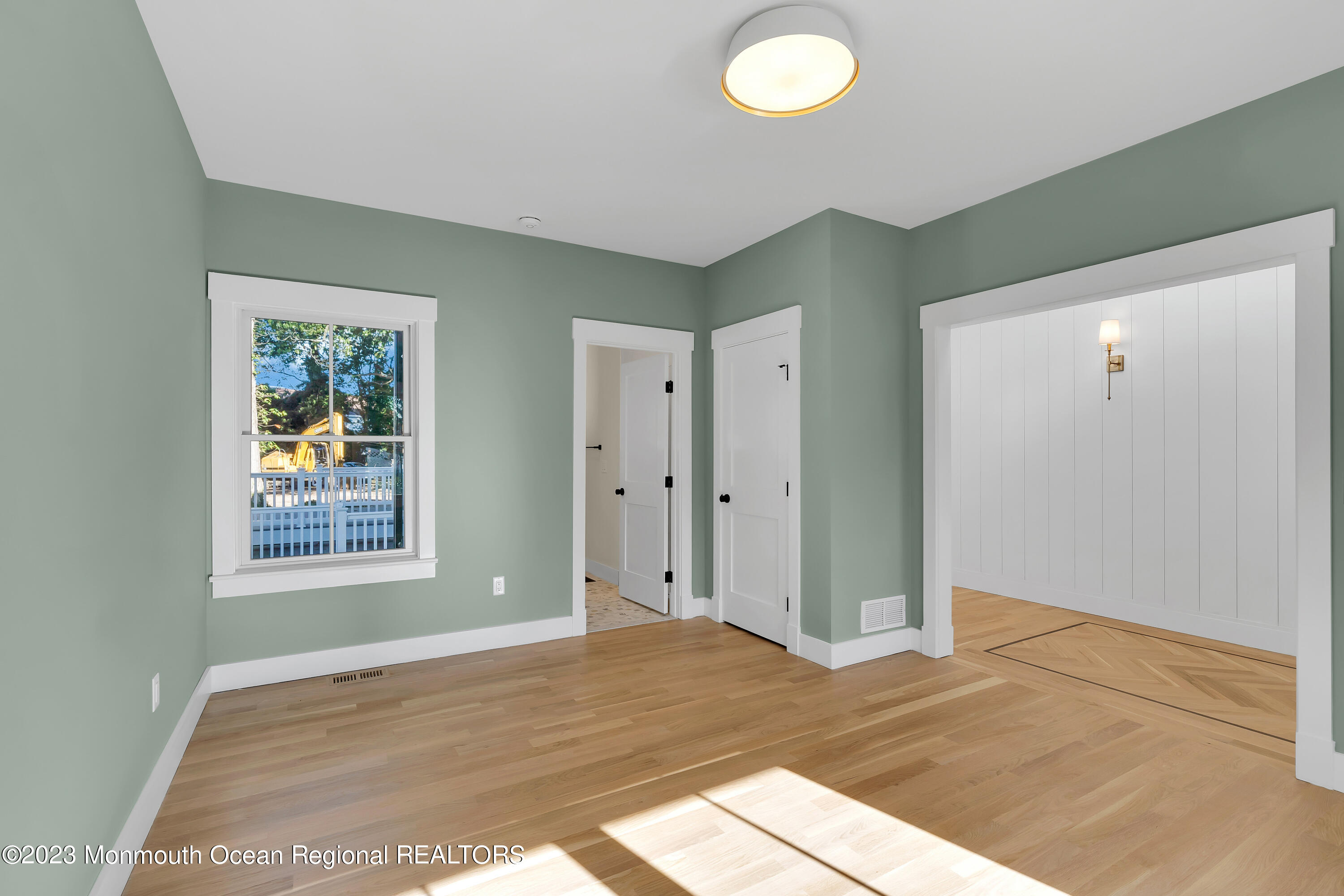 556 Church Street Spring Lake Heights, NJ 07762 - Photo 14 of 85 a view of a room with wooden floor and window