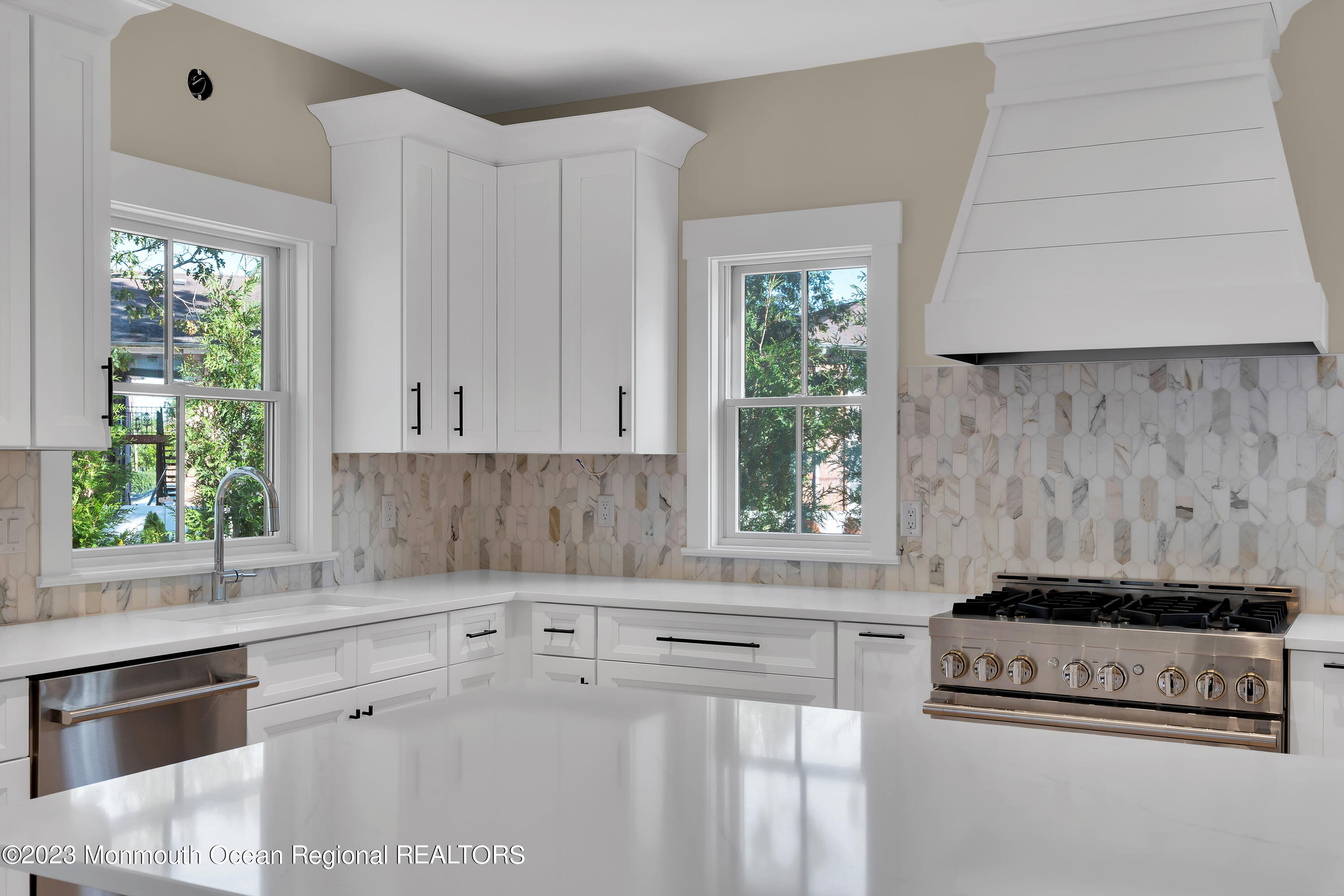 556 Church Street Spring Lake Heights, NJ 07762 - Photo 23 of 85 a kitchen with a stove a sink and a microwave
