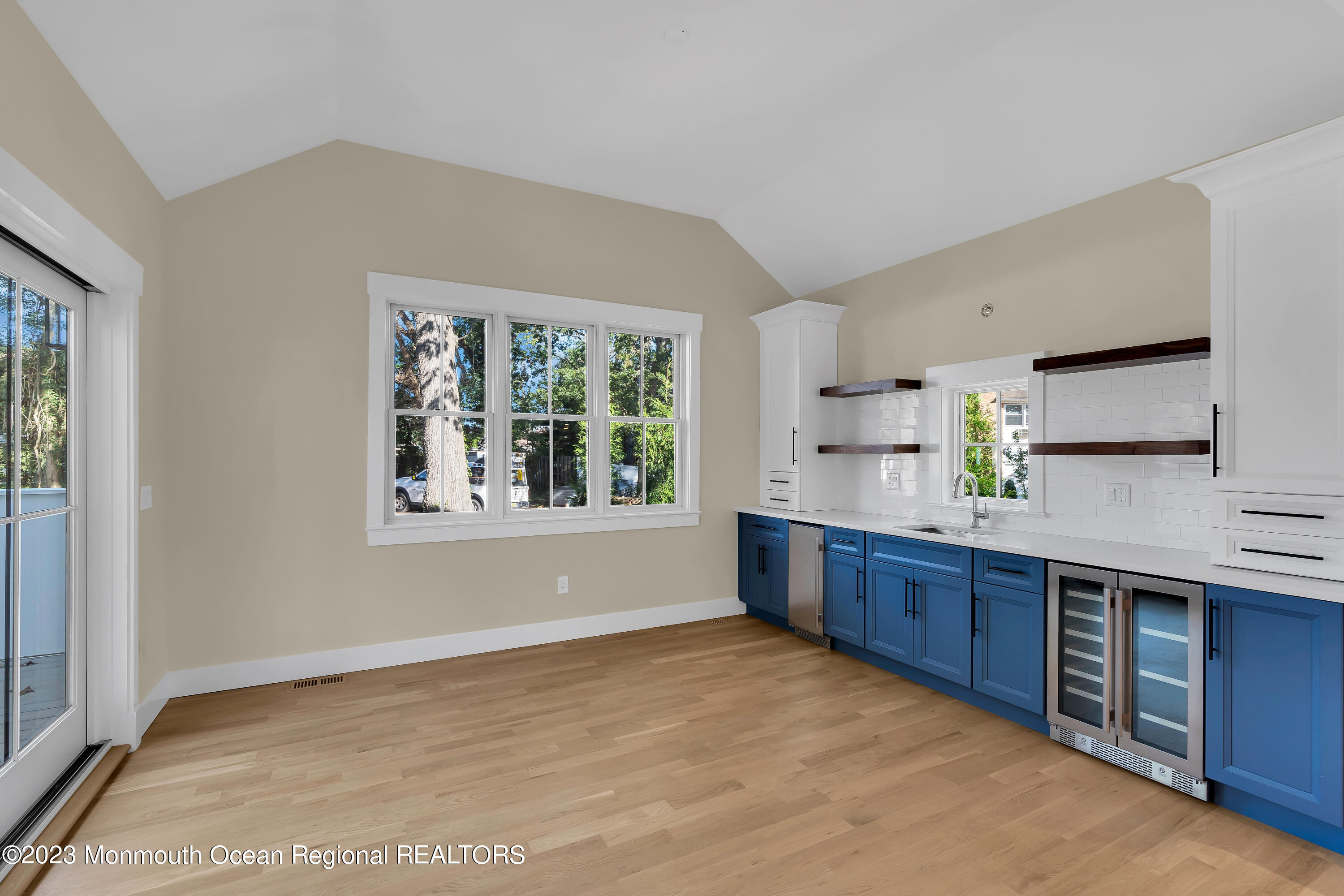 556 Church Street Spring Lake Heights, NJ 07762 - Photo 24 of 85 a large kitchen with stainless steel appliances granite countertop a stove a sink dishwasher and wooden cabinets