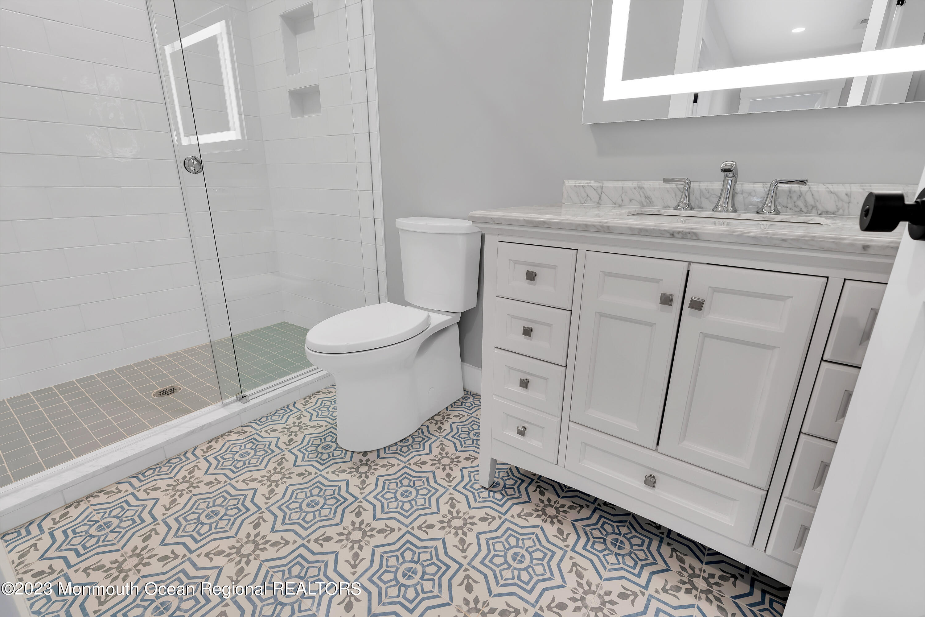 556 Church Street Spring Lake Heights, NJ 07762 - Photo 53 of 85 a bathroom with a sink a toilet and shower