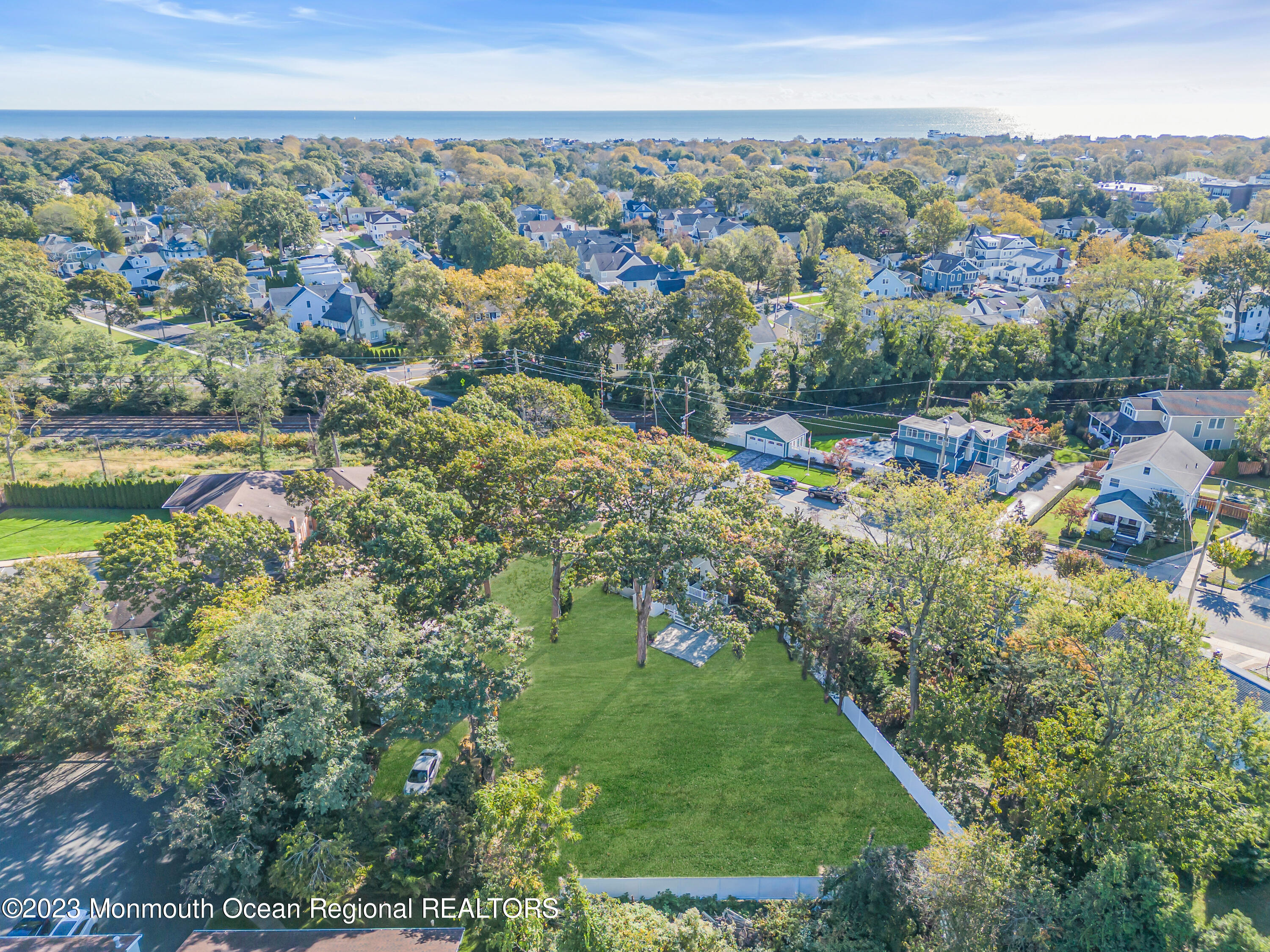 556 Church Street Spring Lake Heights, NJ 07762 - Photo 76 of 85 an aerial view of residential houses with outdoor space and trees
