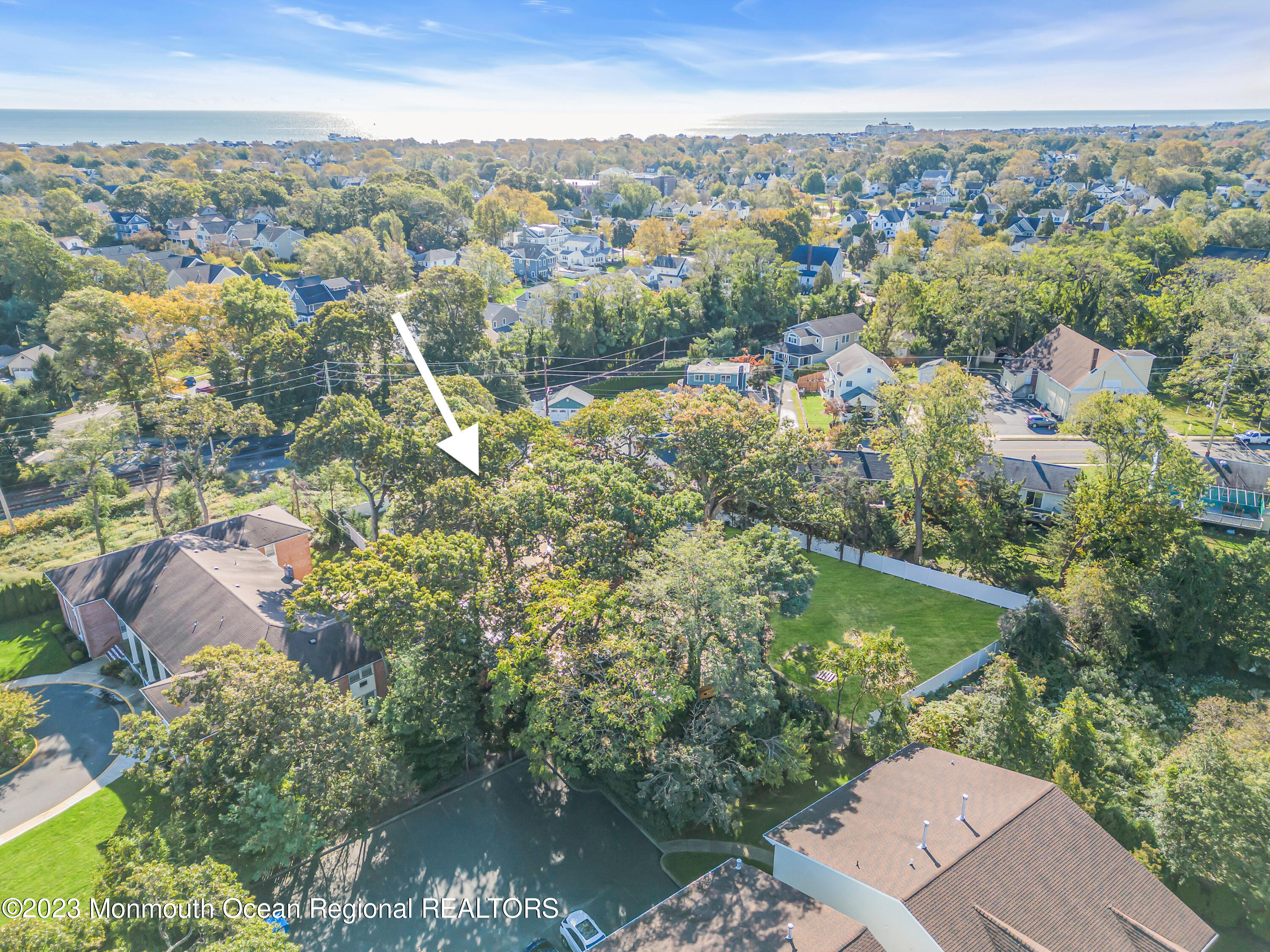 556 Church Street Spring Lake Heights, NJ 07762 - Photo 77 of 85 an aerial view of residential houses with outdoor space and trees