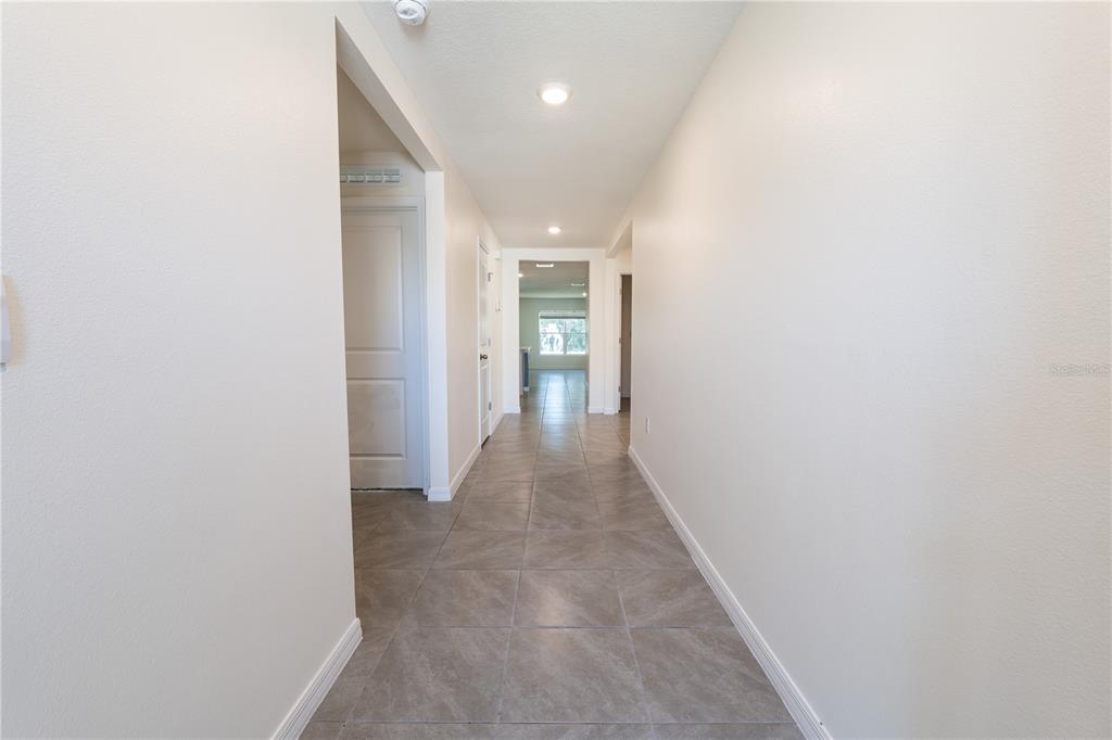 11272 Southeast 67th Circle Belleview, FL 34420 - Photo 15 of 24 a view of a hallway