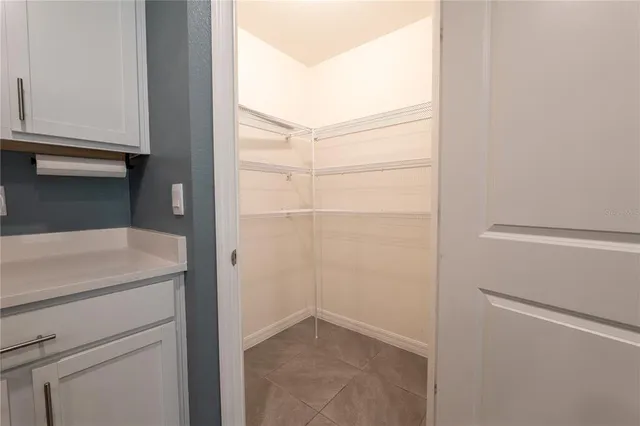 a view of a room with racks on the wall