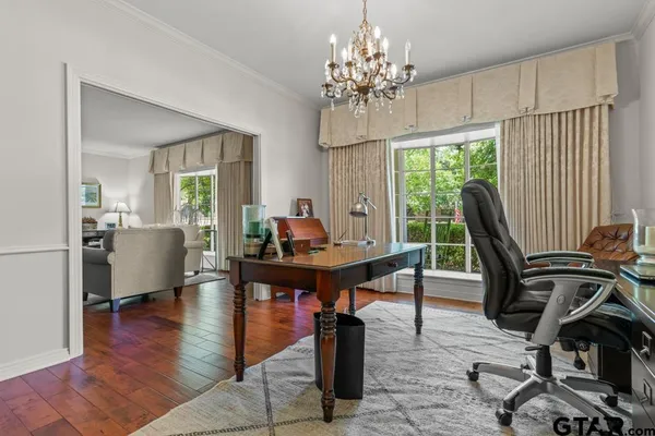 a view of a dining room with furniture window and outside view